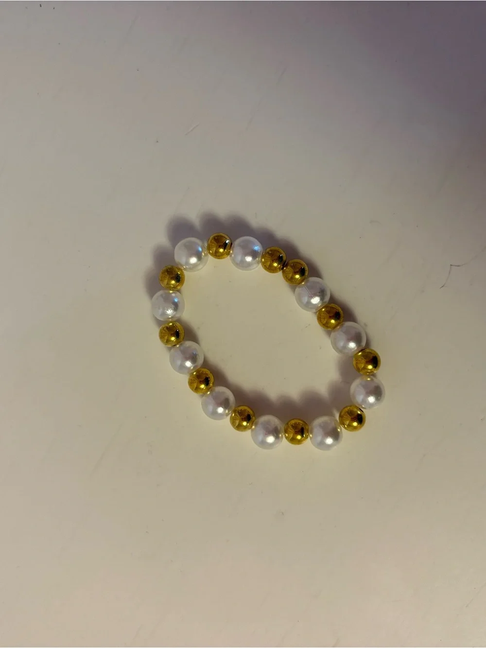 Gold and White Bead Stretch Bracelet